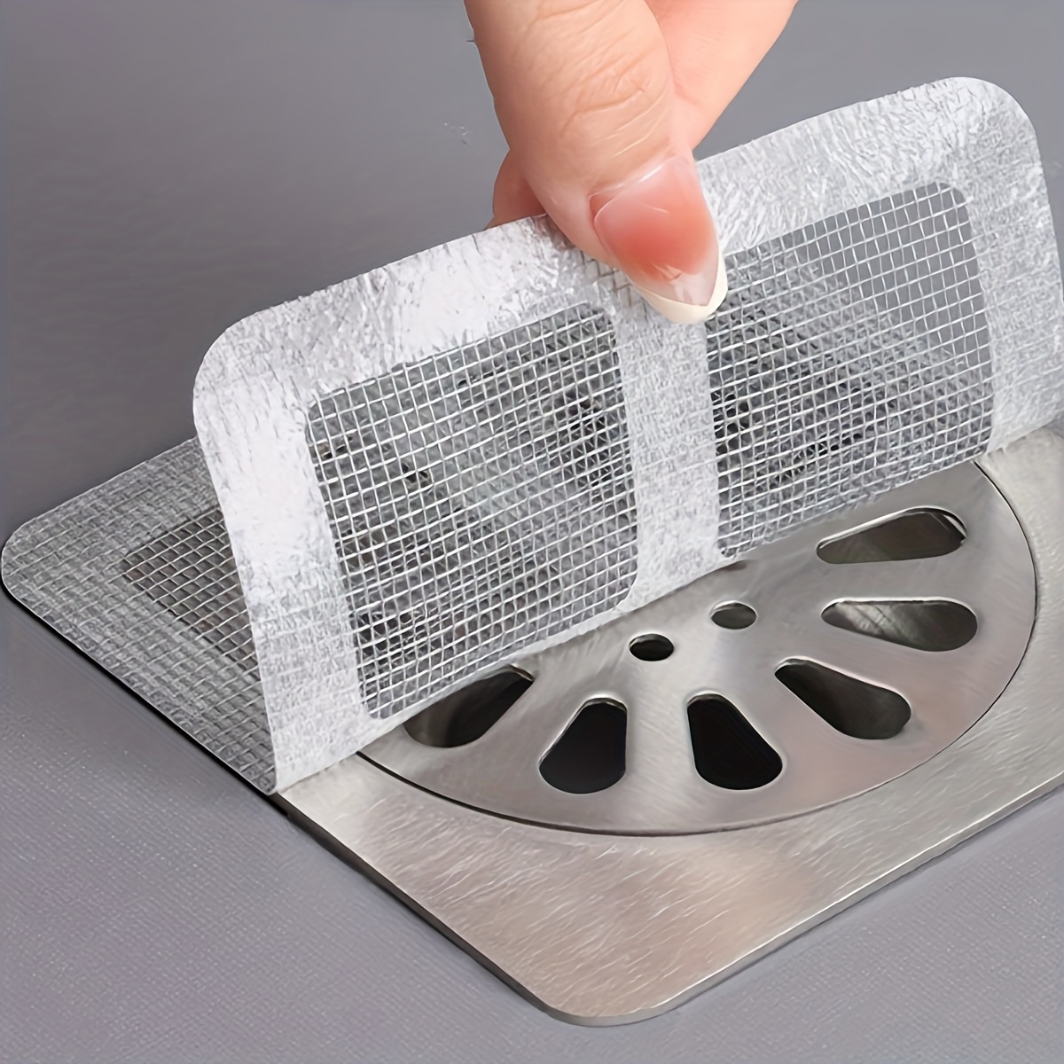 ملصق تصريف أرضي للاستخدام مرة  - مراجعة Drain Hair Catcher وسعره